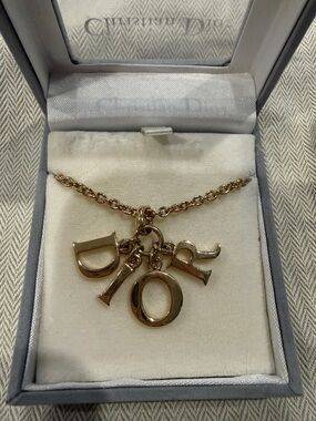 Christian Dior Gold Letter Charm Necklace - Women's Jewelry